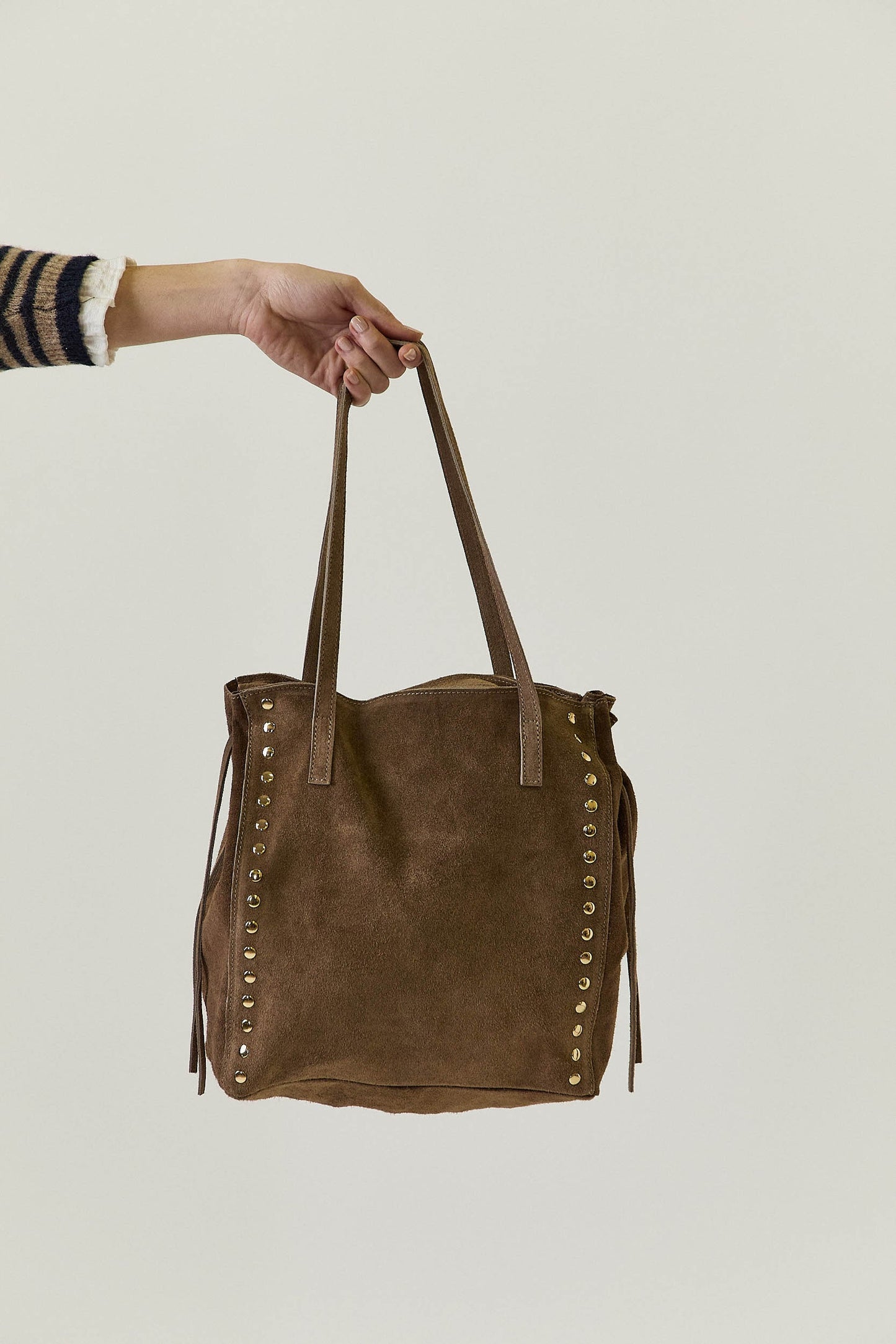 Bolso tachas lazo topo