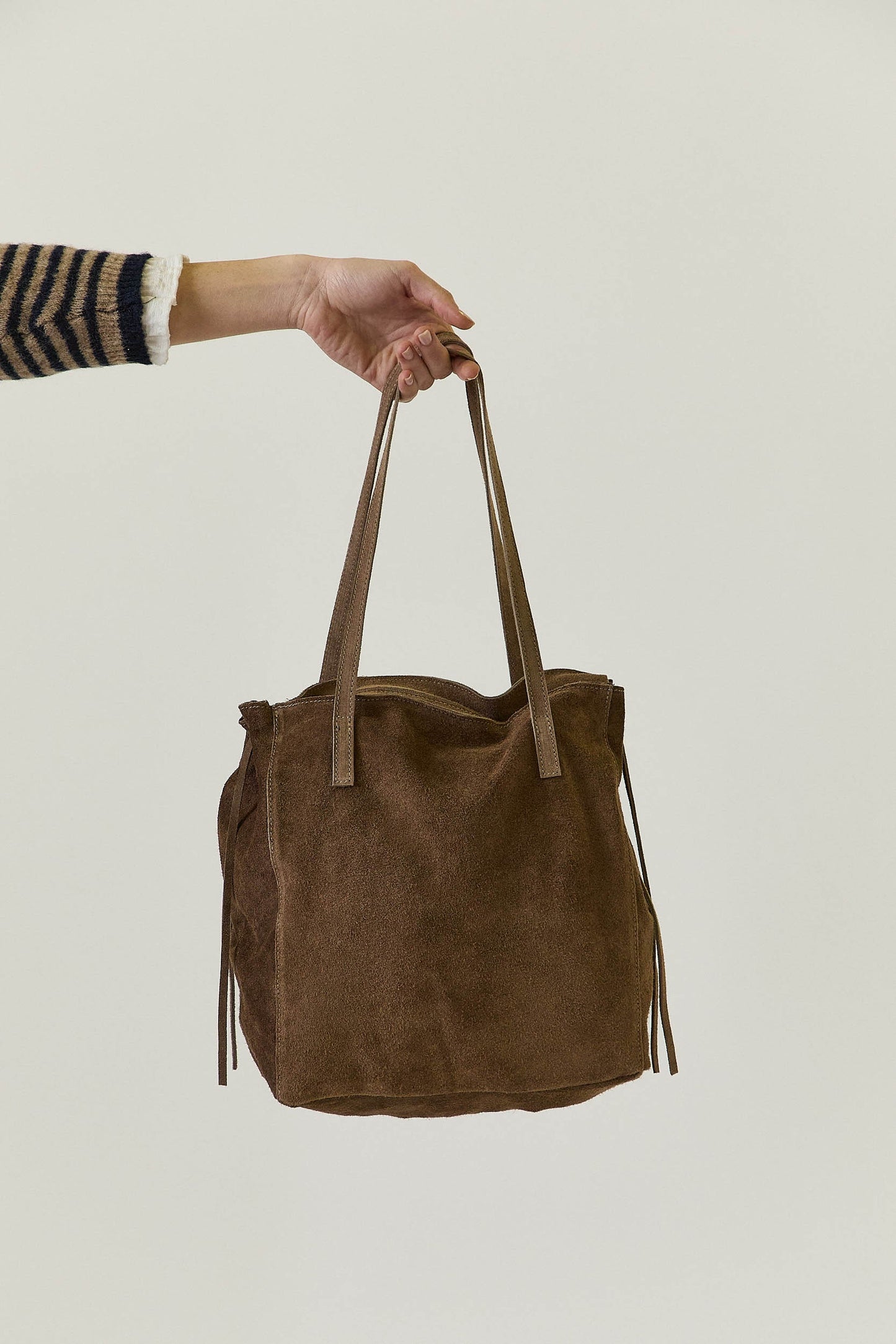 Bolso tachas lazo topo