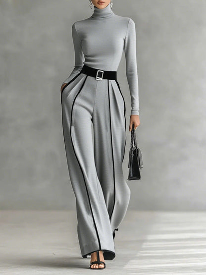Conjunto de top de cuello alto con mangas largas y pantalones anchos con cinturón