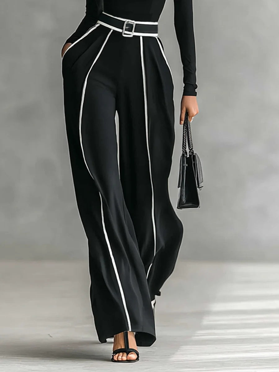 Conjunto de top de cuello alto con mangas largas y pantalones anchos con cinturón