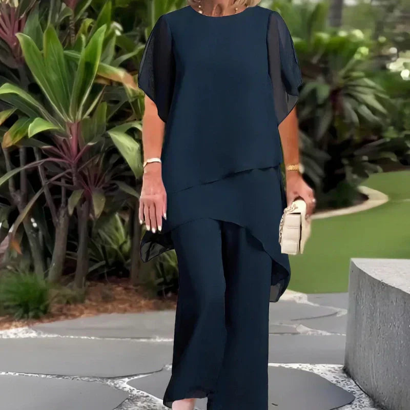 Encantador conjunto de top irregular y pantalones de pierna ancha